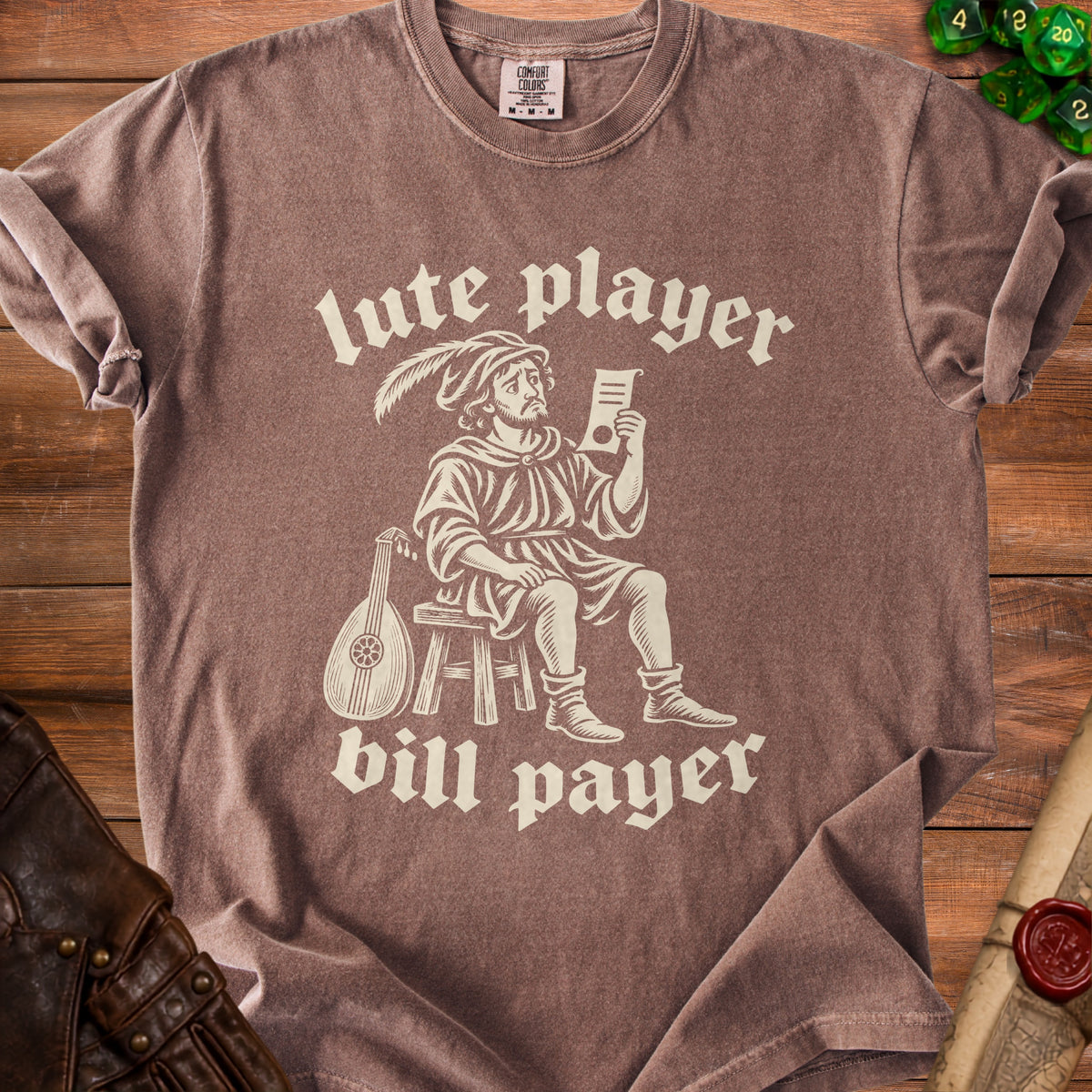 Brown t-shirt with "lute player bill payer" text and graphic.