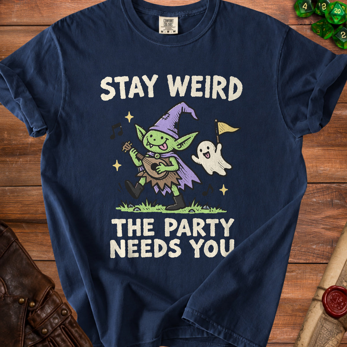 Navy t-shirt with "STAY WEIRD THE PARTY NEEDS YOU" and goblin illustration.