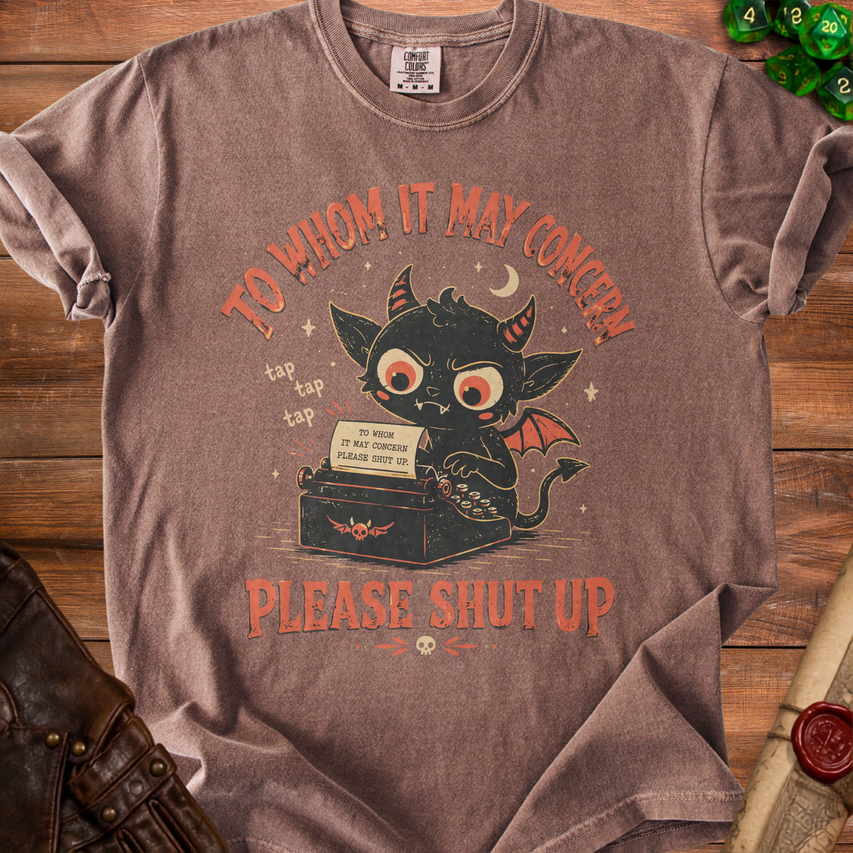 T-shirt with devil at typewriter saying "Please Shut Up."