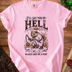 Pink t-shirt with a badger-like creature and the text "I'll see you in Hell, Please save me a seat".
