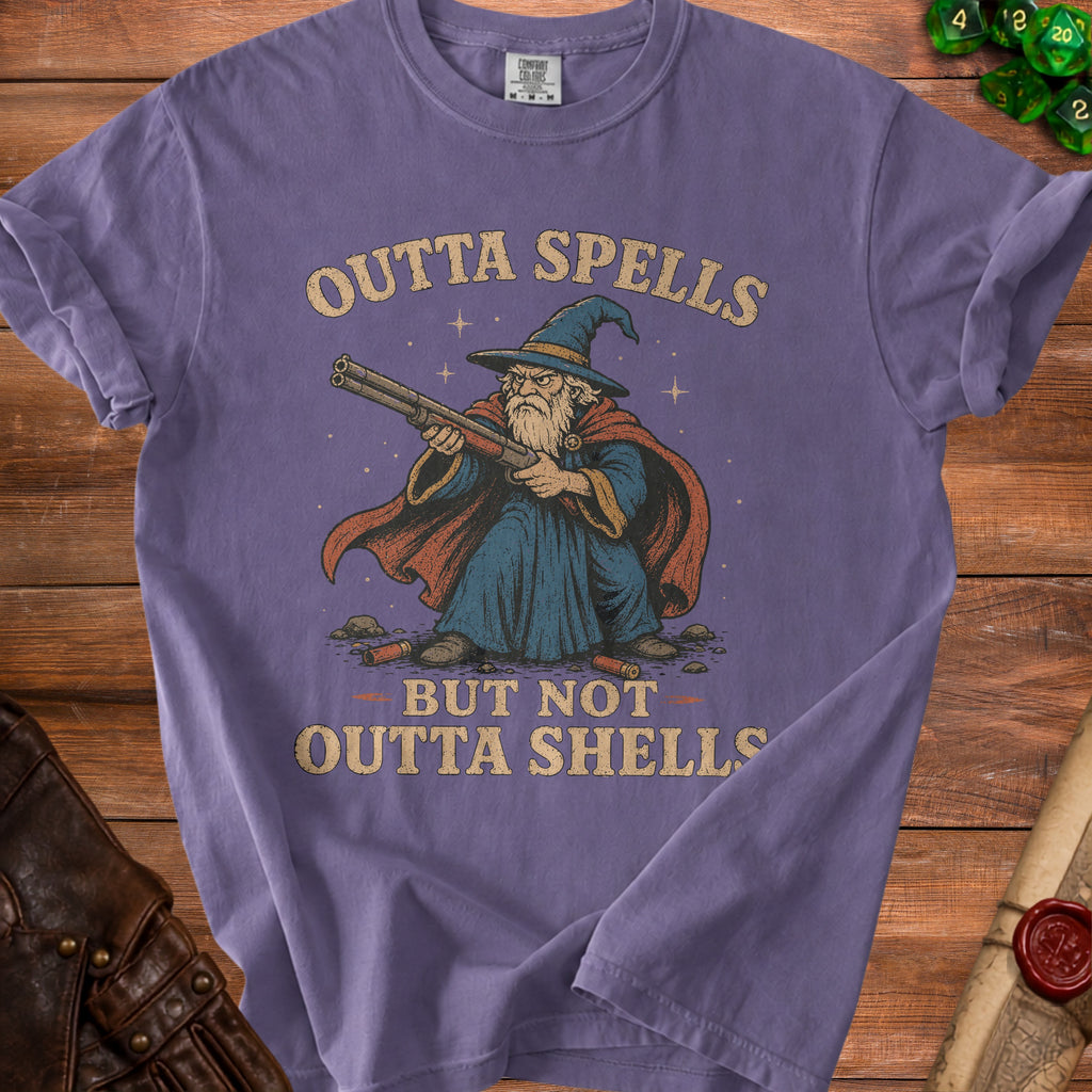 Purple t-shirt with wizard holding shotgun, text "Outta Spells But Not Outta Shells".
