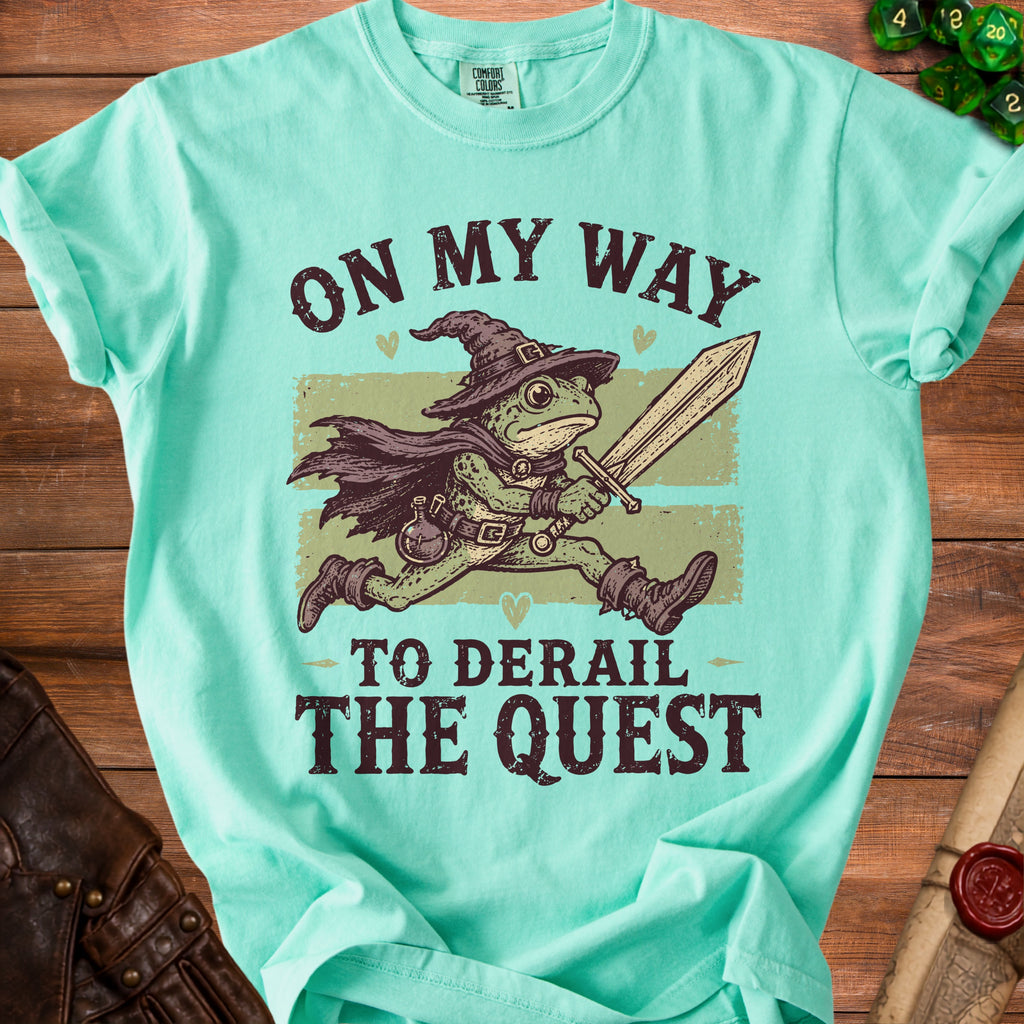 Frog wizard with sword runs on shirt with text "On My Way To Derail The Quest".