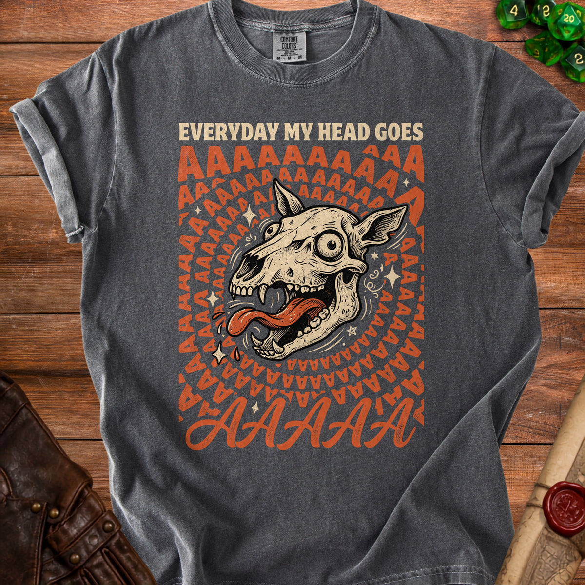 Dark grey t-shirt with a distressed print of a screaming dog skull and the text "EVERYDAY MY HEAD GOES AAAAAAAA".