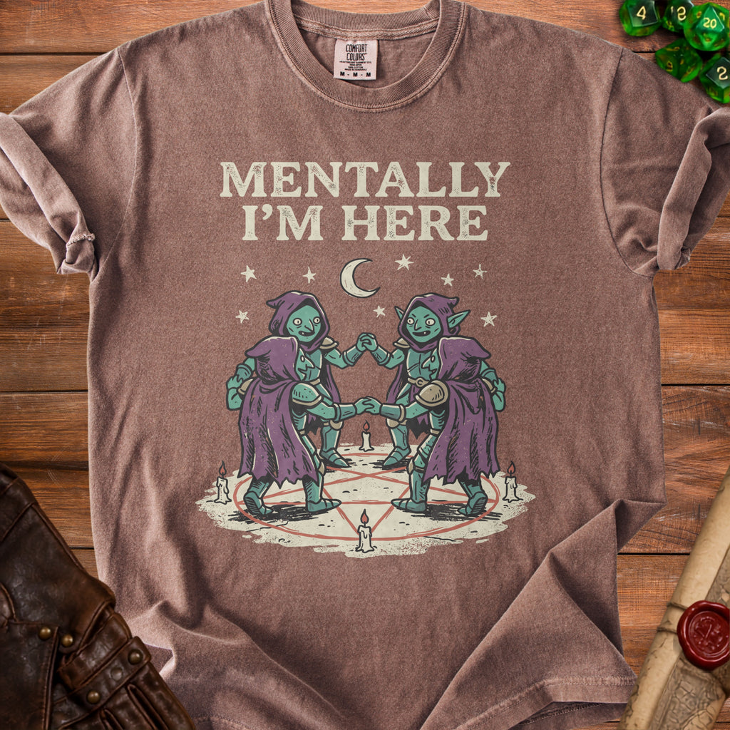 T-shirt with "Mentally I'm Here" text and goblin-like figures in a pentagram.