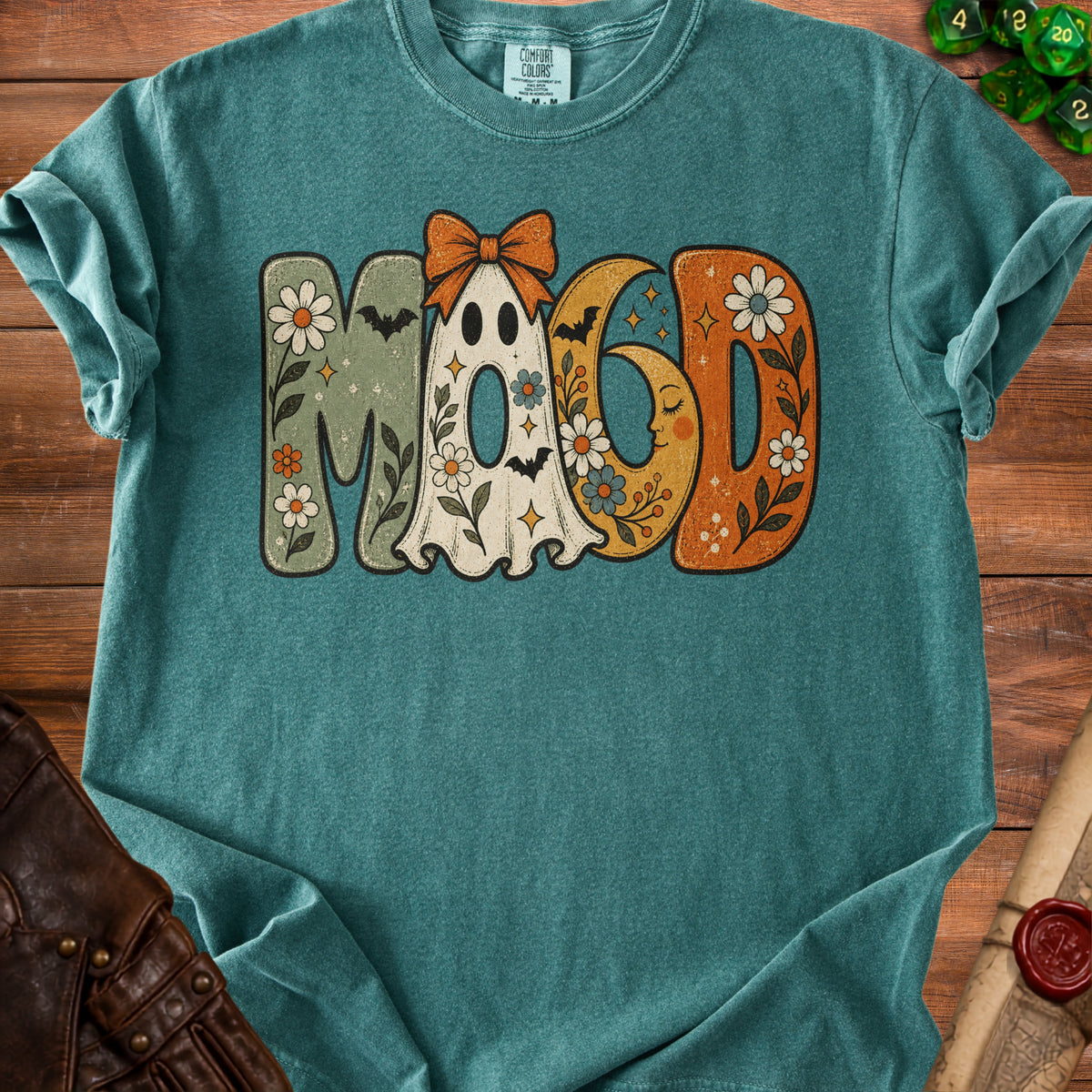 Teal t-shirt with "MOOD" text featuring a ghost, moon, bats, and flowers.