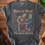 T-shirt with knight lifting weights and text "Born to Hunt Forced to Grind".