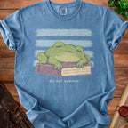 Blue t-shirt with a sleeping frog on a book and "do not summon" text.