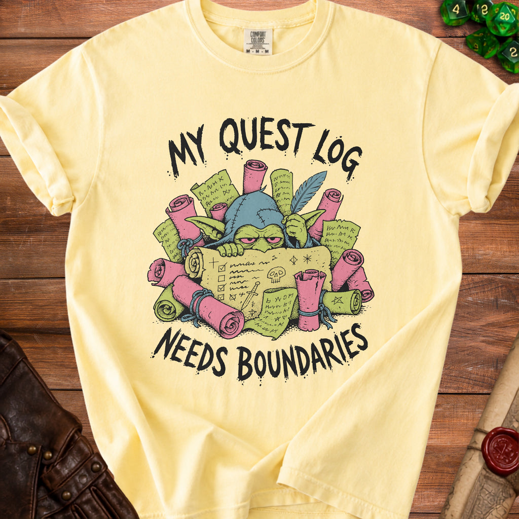 Light yellow t-shirt with "My Quest Log Needs Boundaries" text and goblin illustration.