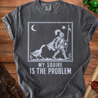 T-shirt graphic with knight, goose, moon, star, and text "MY SQUIRE IS THE PROBLEM".