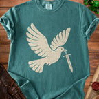 Cream dove graphic holding a sword, printed on a teal t-shirt.
