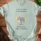 Light green t-shirt with a sloth on a moon graphic and text.