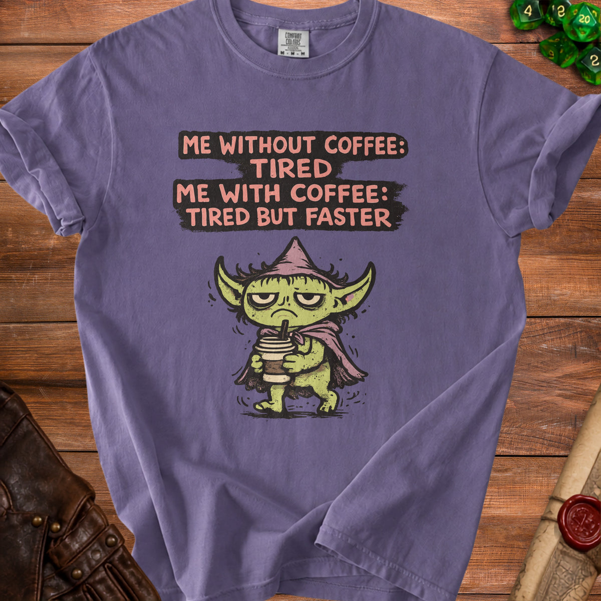 Purple t-shirt with text "Me without coffee: tired. Me with coffee: tired but faster" and a cartoon character.