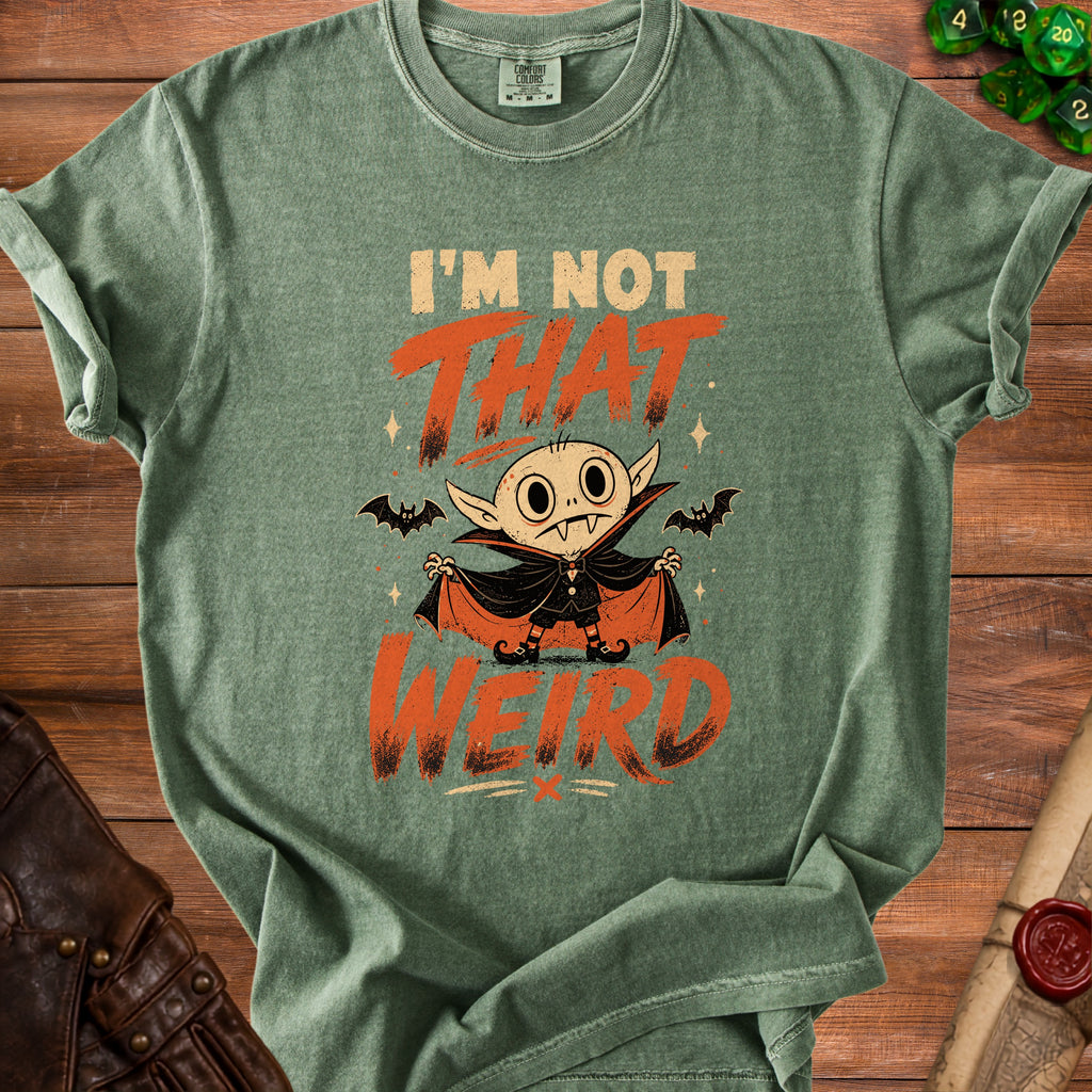 Green t-shirt with "I'm Not That Weird" text and a cartoon vampire.