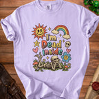 Lilac t-shirt with "I'm Dead Inside" graphic, skeleton, sun, and rainbow.