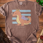 Brown t-shirt with cartoon dragon and text "out of fire".