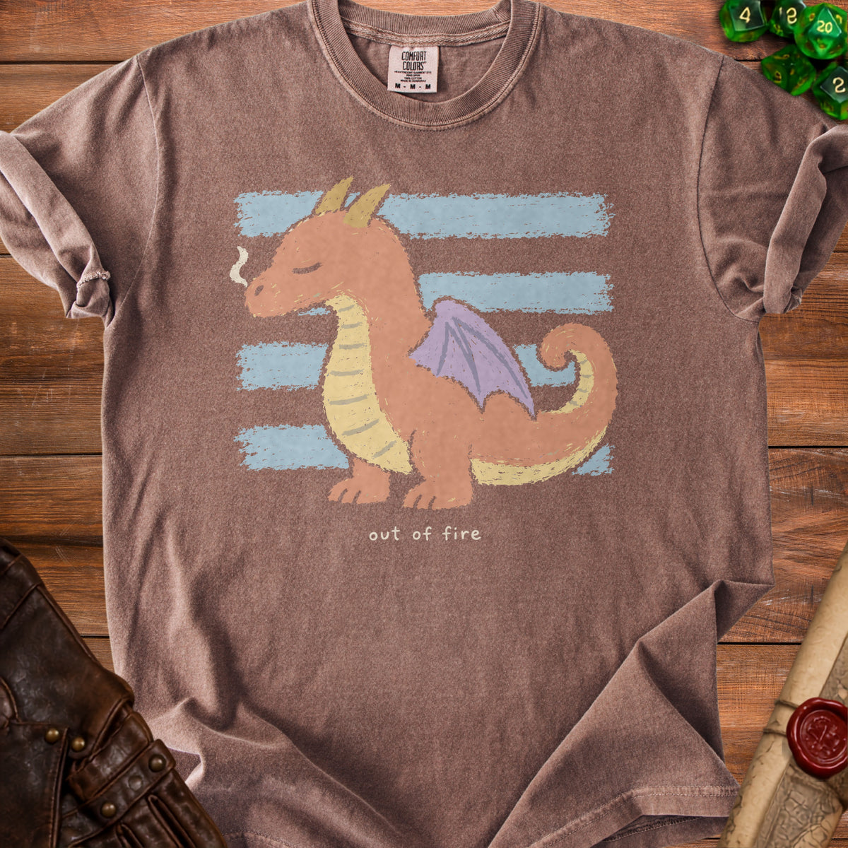 Brown t-shirt with cartoon dragon and text "out of fire".
