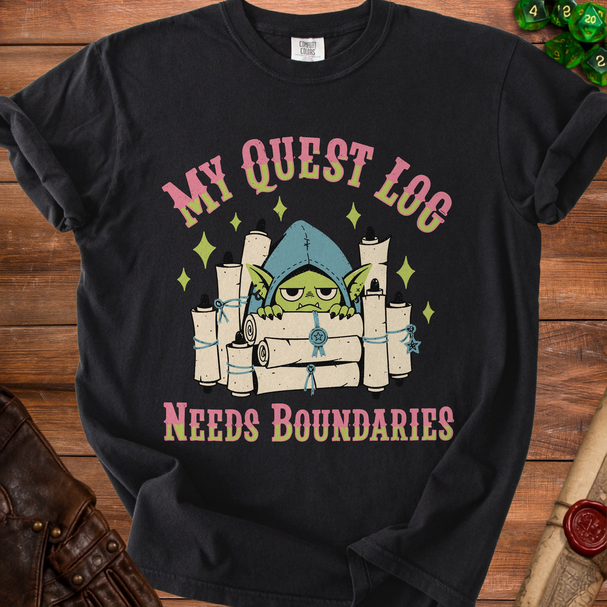 Black t-shirt with a goblin holding scrolls and text: "MY QUEST LOG NEEDS BOUNDARIES".