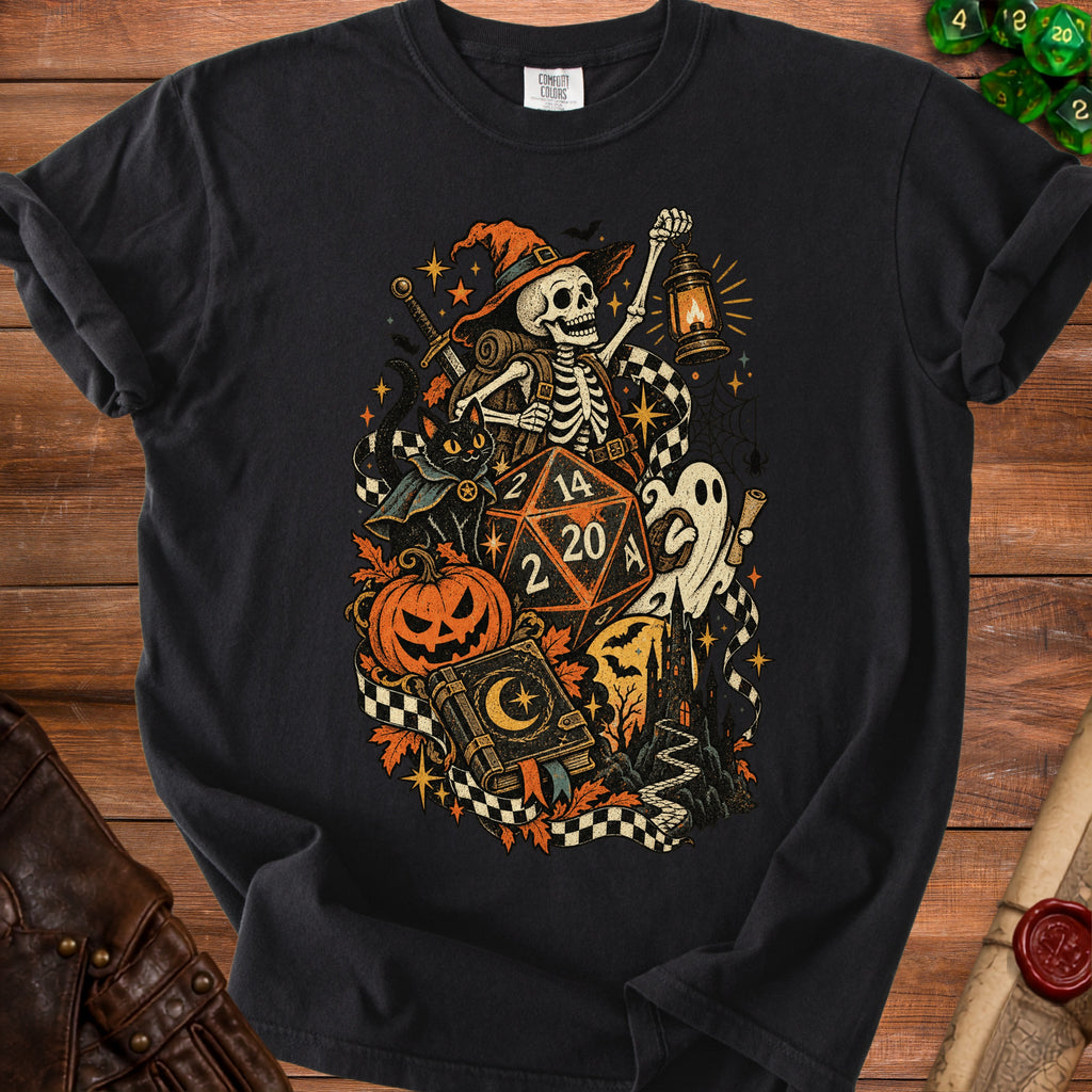 Skeleton adventurer with dice, pumpkin, ghost, and book on a black t-shirt.