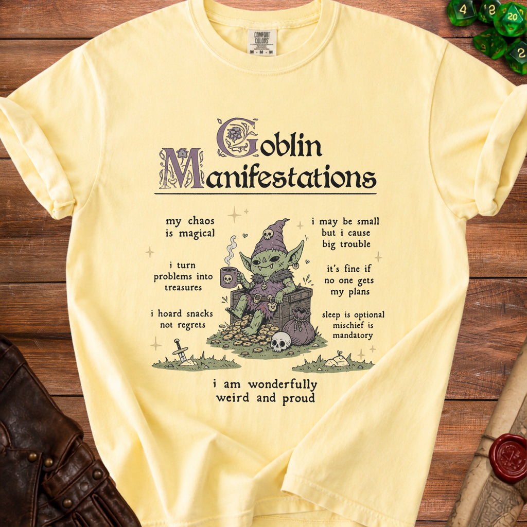 Yellow t-shirt with "Goblin Manifestations" text and illustration of a goblin with coins.