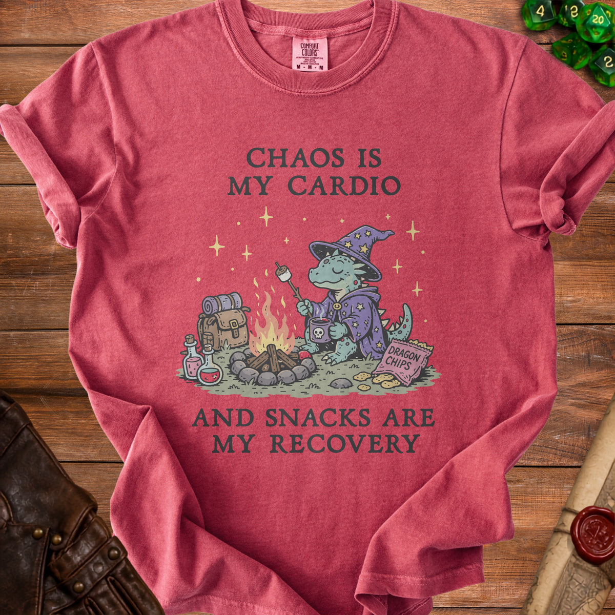 Crimson t-shirt with a wizard dragon roasting marshmallows and text "Chaos is my cardio".