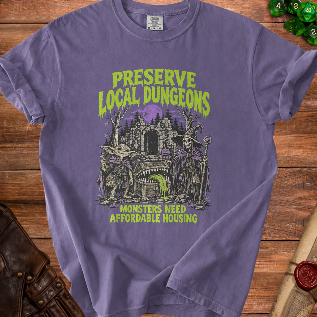T-shirt with "Preserve Local Dungeons Monsters Need Affordable Housing" graphic.