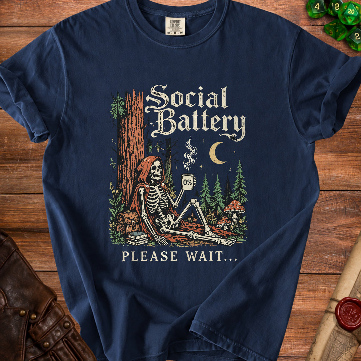 Skeleton in a forest holding coffee with "Social Battery 0%" and "Please Wait..." text.