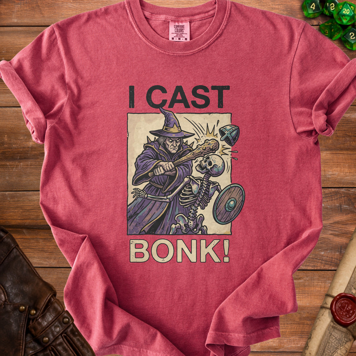 Red t-shirt with "I CAST BONK!" text and wizard attacking skeleton graphic.