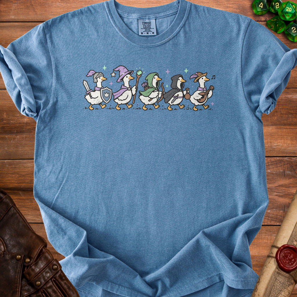 Blue t-shirt with a graphic of geese dressed as fantasy adventurers.