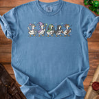 Blue t-shirt with a graphic of geese dressed as fantasy adventurers.