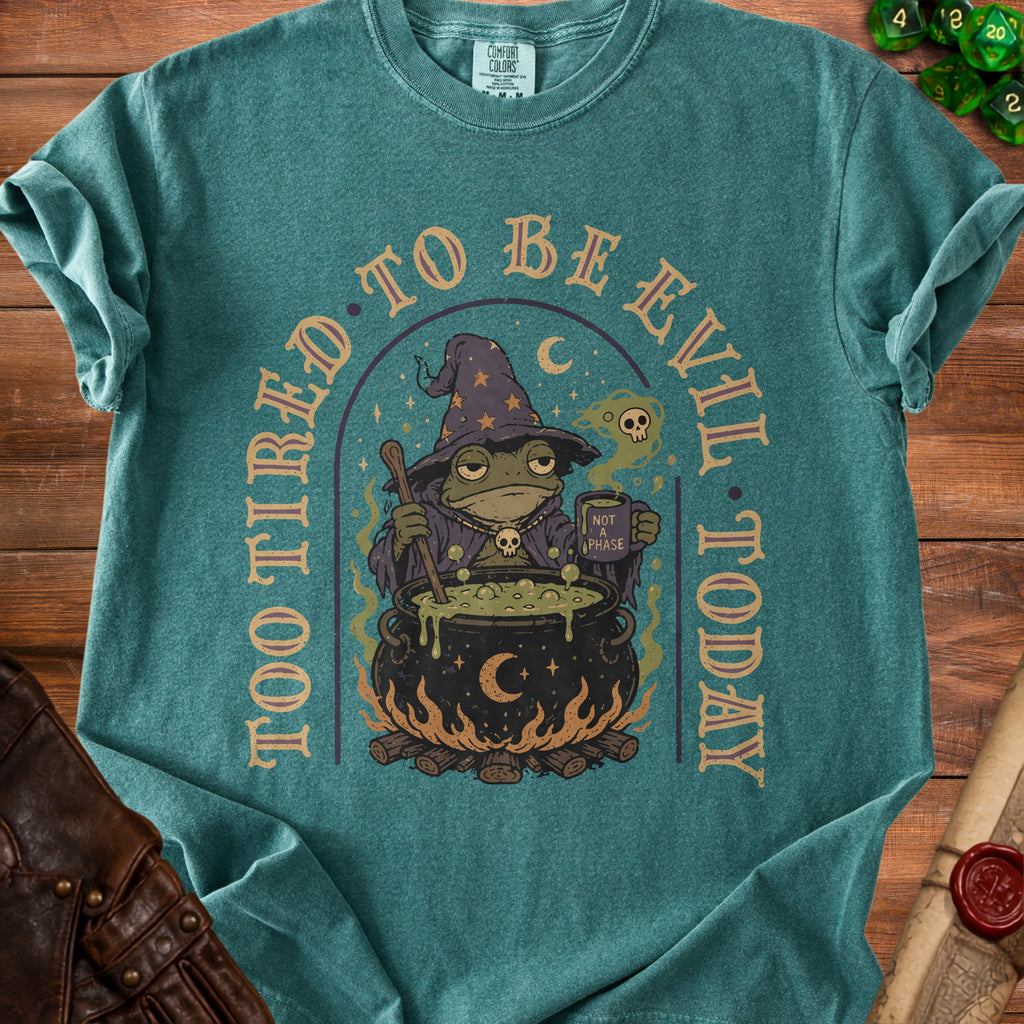 Frog wizard stirs cauldron with "Too tired to be evil today" text.