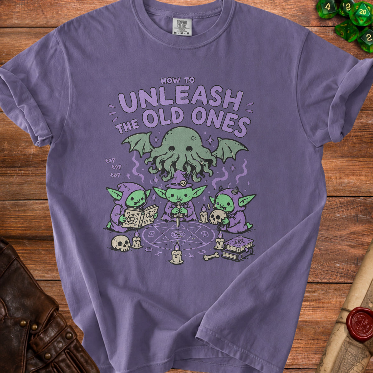 Purple t-shirt with "How to Unleash the Old Ones" graphic featuring goblins and Cthulhu.