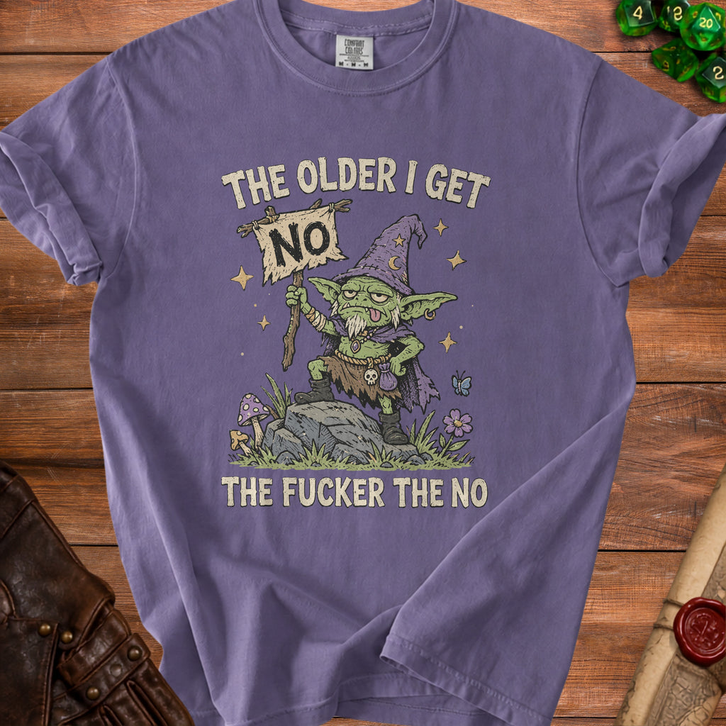 Goblin with wizard hat holding "NO" sign, text says "THE OLDER I GET THE FUCKER THE NO".