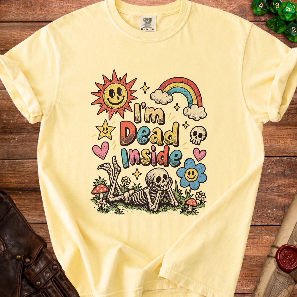 Yellow t-shirt with a skeleton, sun, rainbow, and text "I'm Dead Inside."