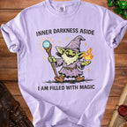Lilac t-shirt with goblin wizard and text: "Inner Darkness Aside, I Am Filled With Magic".