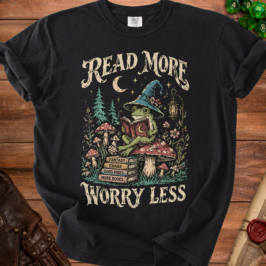 Black t-shirt with "Read More Worry Less" text, a frog reading, and books.