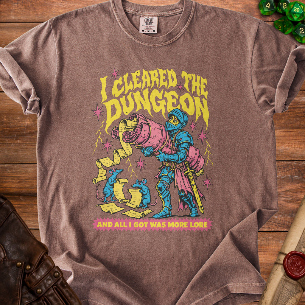 Knight holding a large scroll, with mice reading scrolls. Text says "I cleared the dungeon and all I got was more lore."