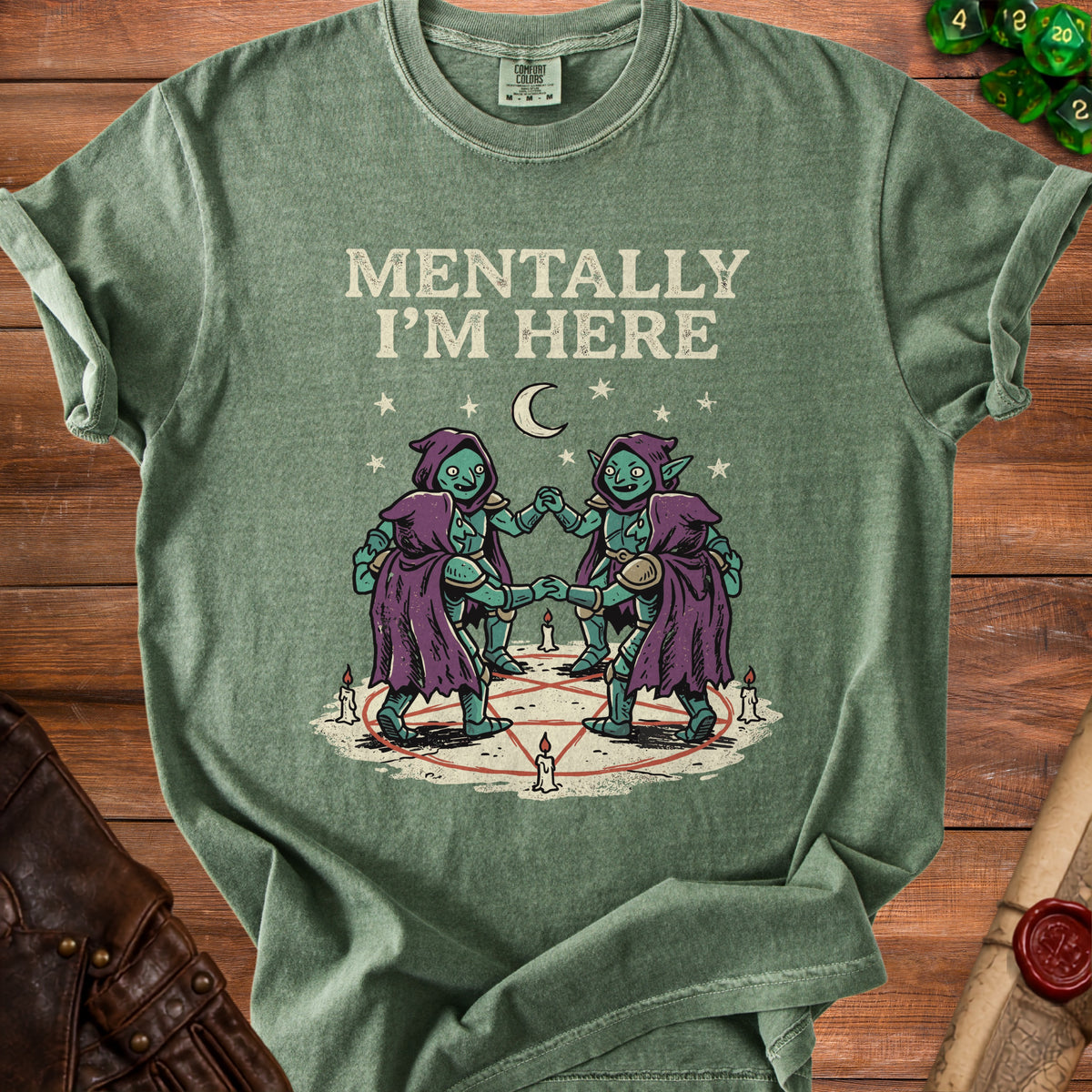 Green t-shirt with "Mentally I'm Here" text and goblins in a ritual circle.