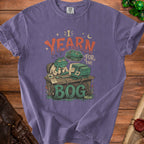 T-shirt graphic of a frog at a desk, dreaming of the bog.