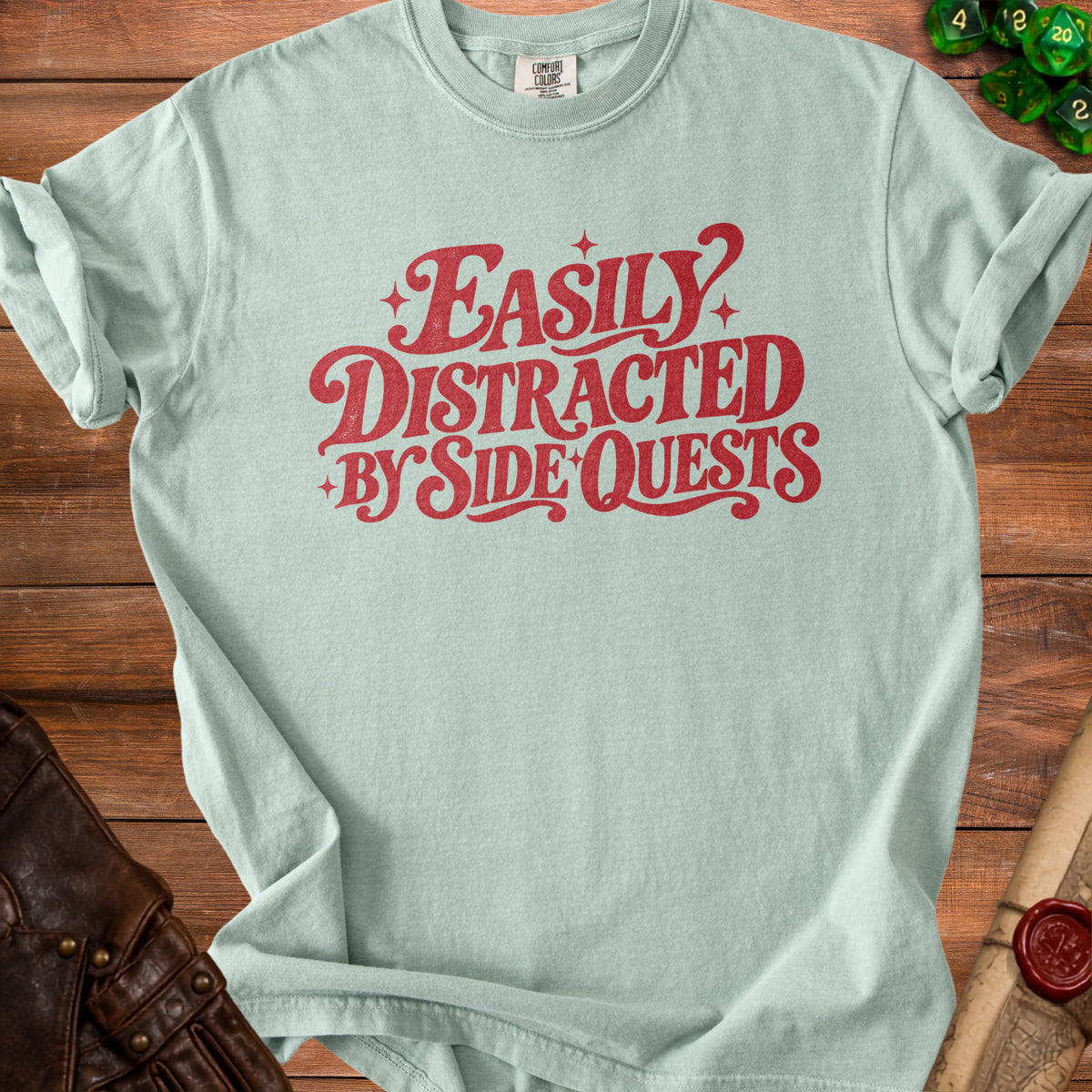 Light blue t-shirt with red "Easily Distracted By Side Quests" text.