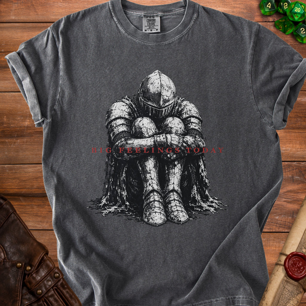 Dark gray t-shirt featuring a knight in armor holding knees with text "BIG FEELINGS TODAY."