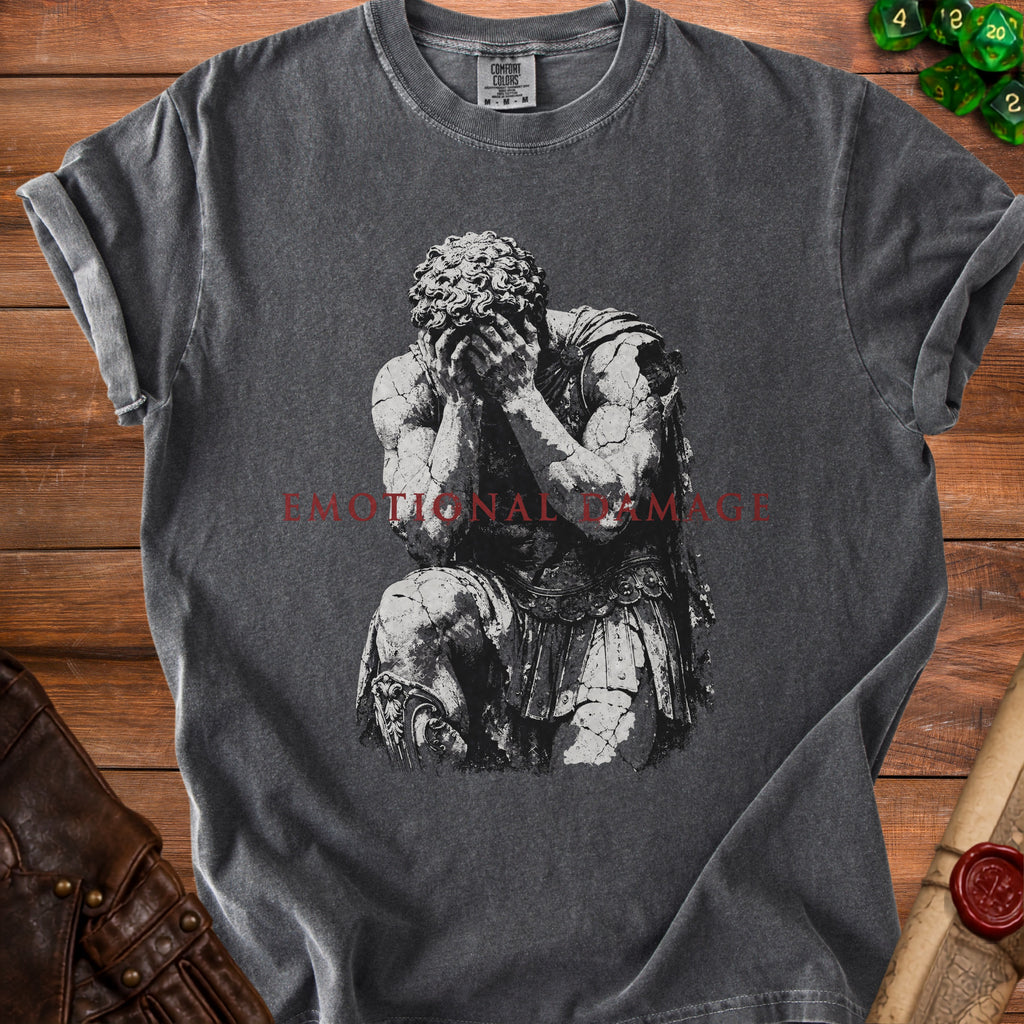 Dark grey t-shirt with a distressed print of a kneeling Roman soldier and text "EMOTIONAL DAMAGE."