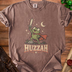 T-shirt with a cartoon frog wearing a cape holding a sword and the text "HUZZAH".