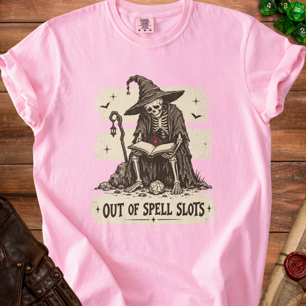 Skeleton wizard reading a book with text "OUT OF SPELL SLOTS".