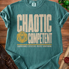 Teal t-shirt with "CHAOTIC COMPETENT" and a d20 dice.