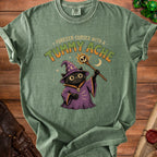 Green t-shirt with black wizard cat graphic and "Forever Cursed with a Tummy Ache" text.