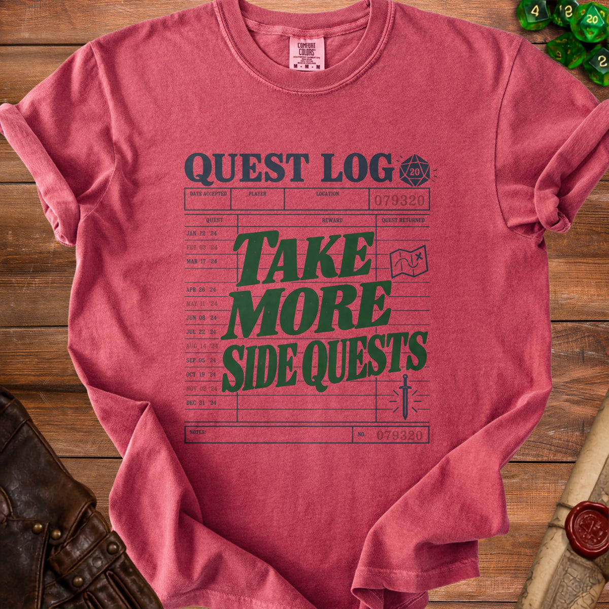 Red t-shirt with "Quest Log Take More Side Quests" graphic and D20 dice.
