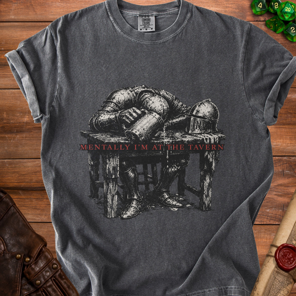 T-shirt with a knight passed out at a table with a beer mug.