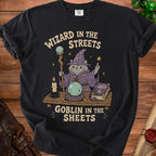 Black t-shirt with wizard cat graphic and text "Wizard in the streets, goblin in the sheets."