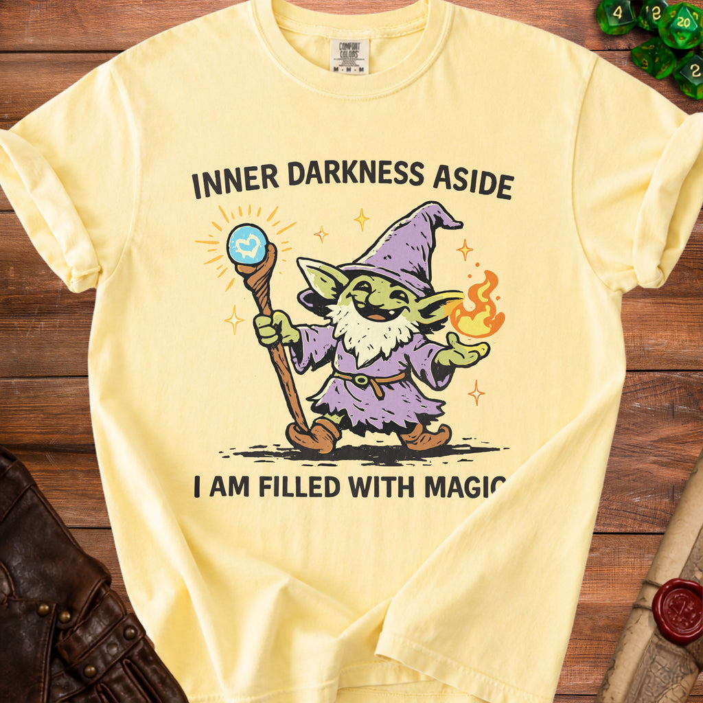 Yellow t-shirt with a goblin wizard graphic and text "Inner Darkness Aside, I Am Filled With Magic".