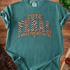 Teal t-shirt with "Cute Feral & Rolls for Initiative" text and dice graphic.
